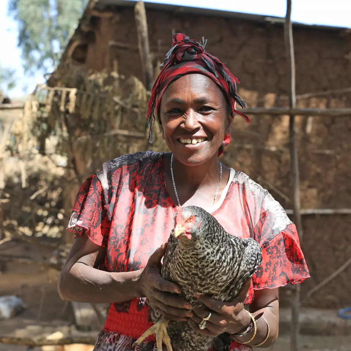 Woman holding chicken