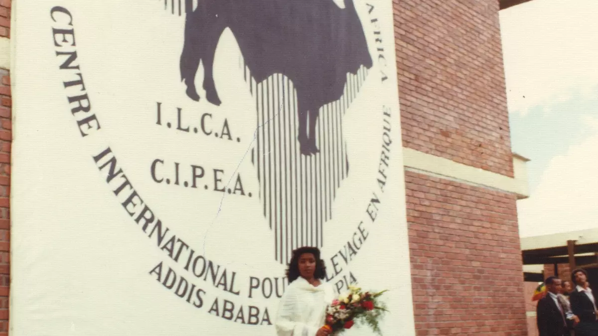 Senait Asfaw is seen ready to offer the bouquet of flowers
